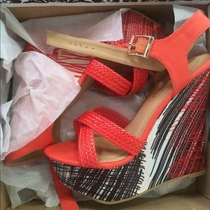 Orange & Black sketchy heeled boots